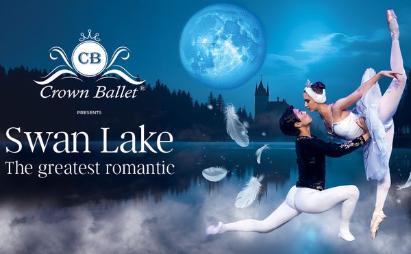 Ballet dancers in white and black costumes perform an elegant lift against a moonlit lake backdrop. Floating feathers and text read "Crown Ballet presents Swan Lake The greatest romantic." Serene and magical tone.