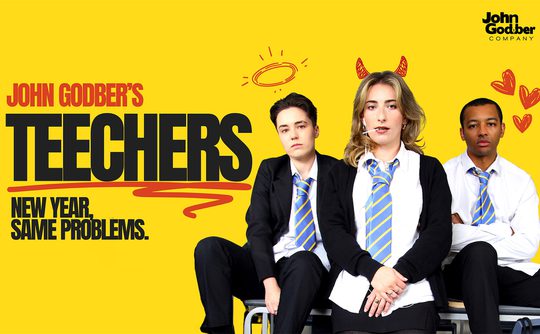 Three individuals in school uniforms sit confidently against a bright yellow background. Doodles of a halo, devil horns, and hearts are above them, adding a playful tone. The text reads "John Godber's Teechers" and "New Year, Same Problems."