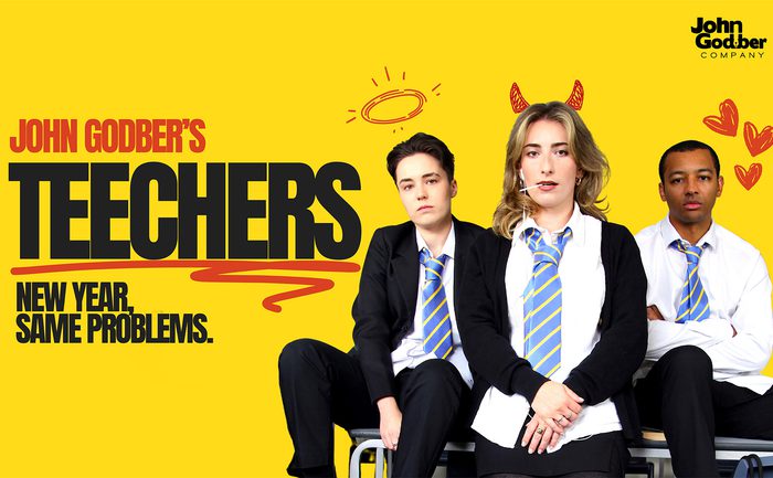 Three individuals in school uniforms sit confidently against a bright yellow background. Doodles of a halo, devil horns, and hearts are above them, adding a playful tone. The text reads "John Godber's Teechers" and "New Year, Same Problems."