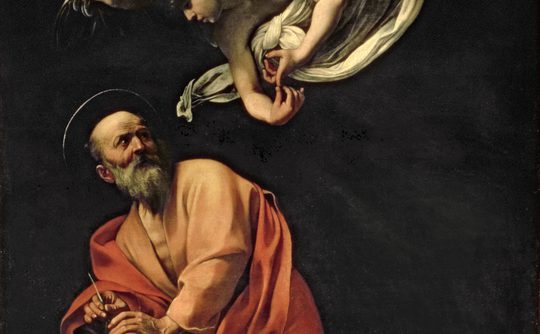 Classic painting by Caravaggio of St Matthew and the Angel 1602. A bearded man in a red robe writes with a quill, gazing up at a winged figure above him. The scene is dramatic with dark tones and intense focus.